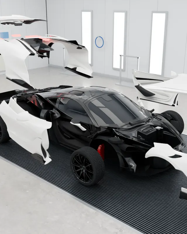 Supercar with its panels removed for collision repair in the paint booth